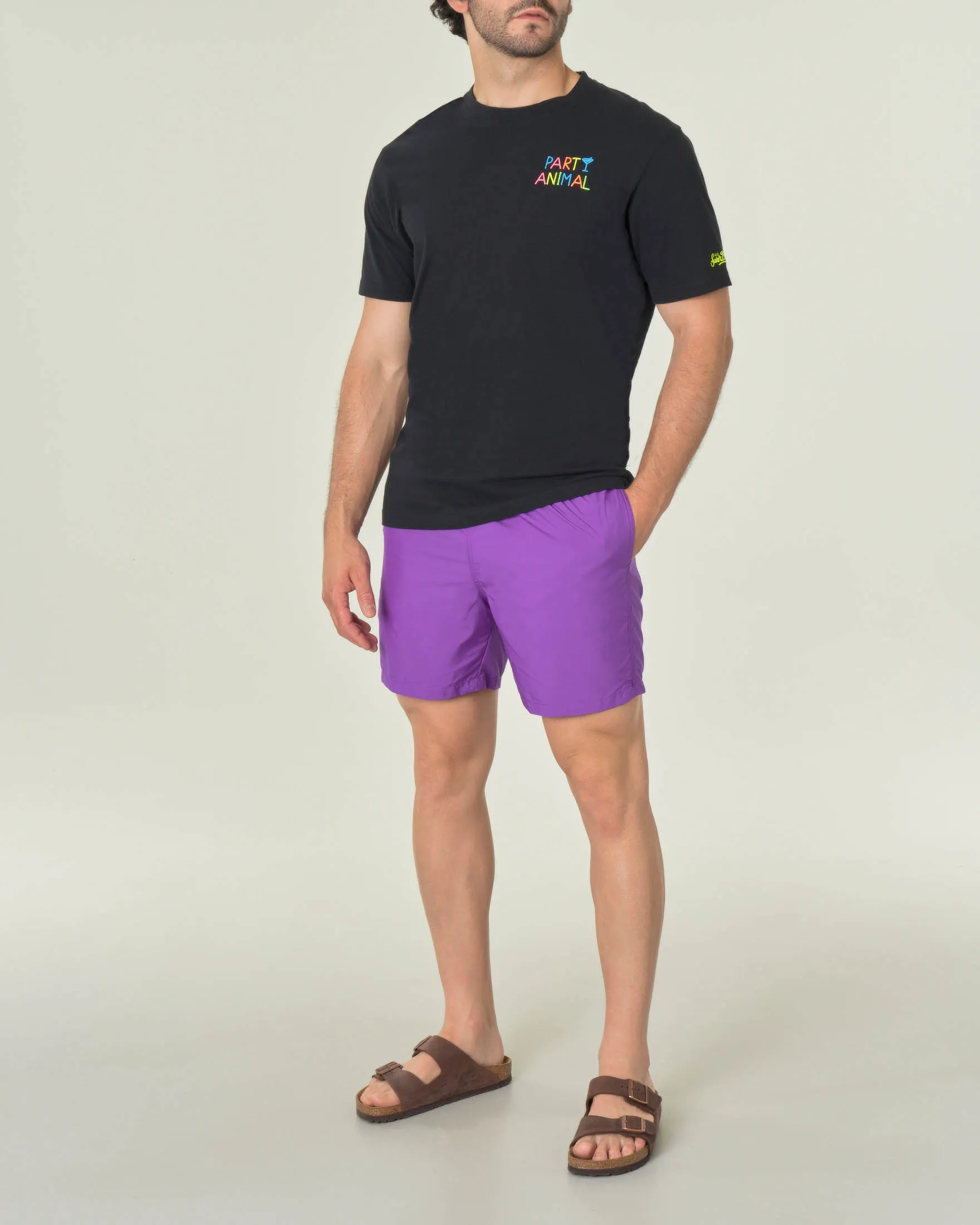 T-shirt nera mezza manica con scritta Party Animal multicolor sul petto